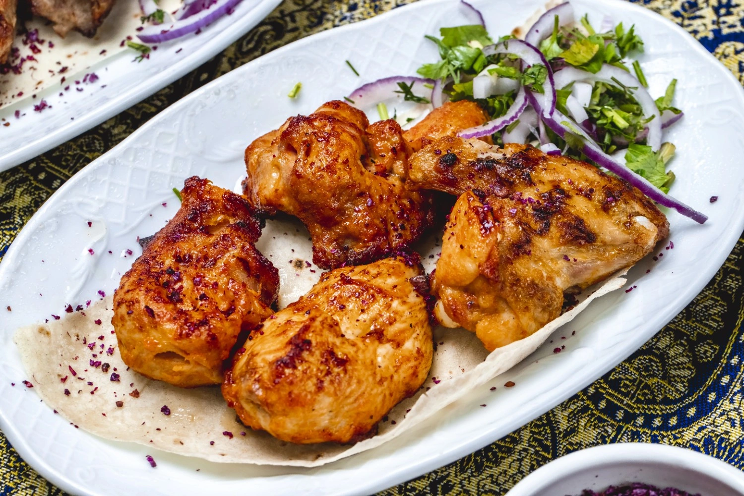 Authentic Chicken Tikka Thighs at Sizzling Grill in Calgary